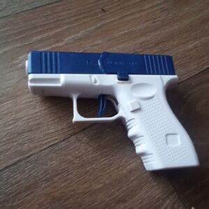 Blue and White Toy Gun